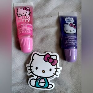 Hello kitty lip gloss cotton candy and grape. Plus a hello kitty sticker